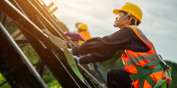 a-roofer-using-safety-equipment-while-on-a-roof