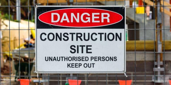 a-sign-letting-people-know-to-be-aware-of-the-dangers-on-a-construction-site